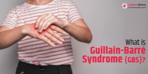 A person holding their hand in discomfort The text on the image reads 'What is Guillain-Barré Syndrome (GBS)?