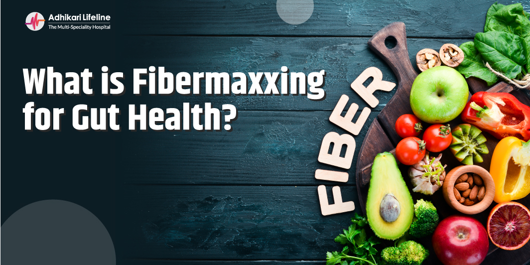 Fibermaxxing for Gut Health – fruits, vegetables, nuts, and avocado on a wooden board – Adhikari Lifeline Hospital